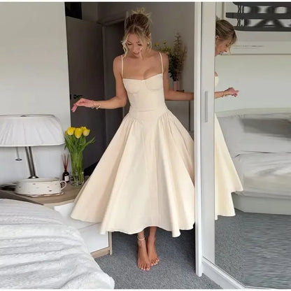 Elegantiška pliusuota vasarinė suknelė